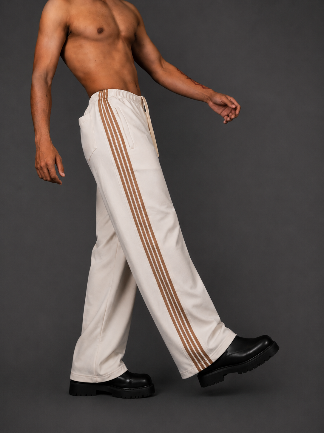 PARALLEL STRIPE BAGGY PANTS